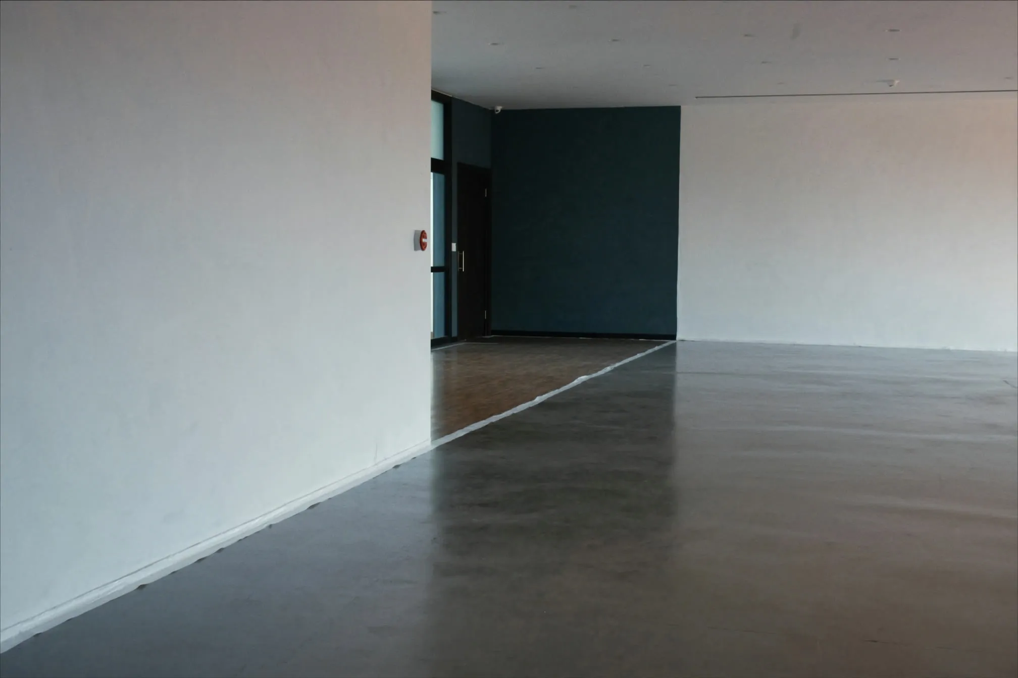 Freshly painted office with charcoal and white walls