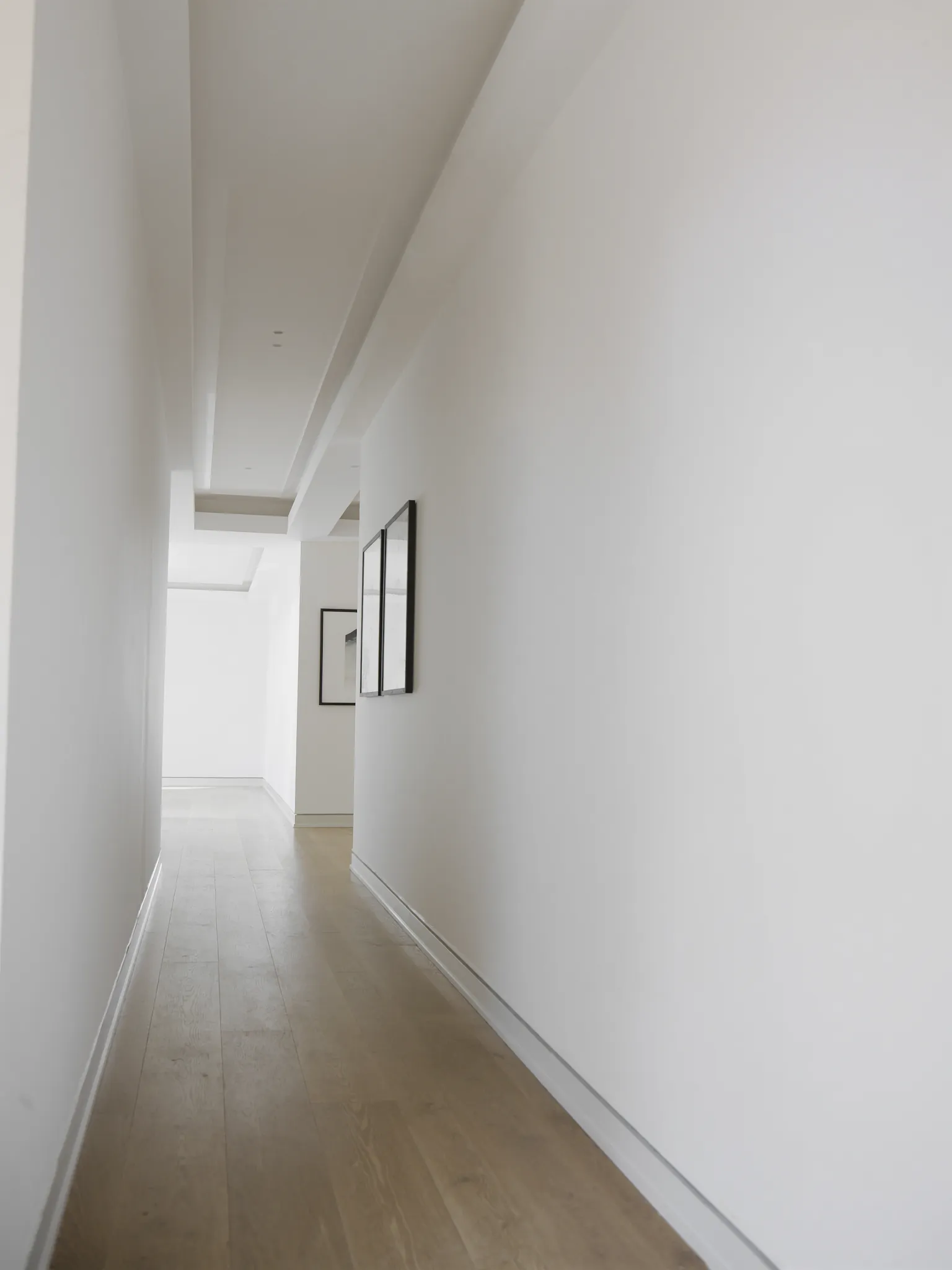Hallway with flawless matte white walls